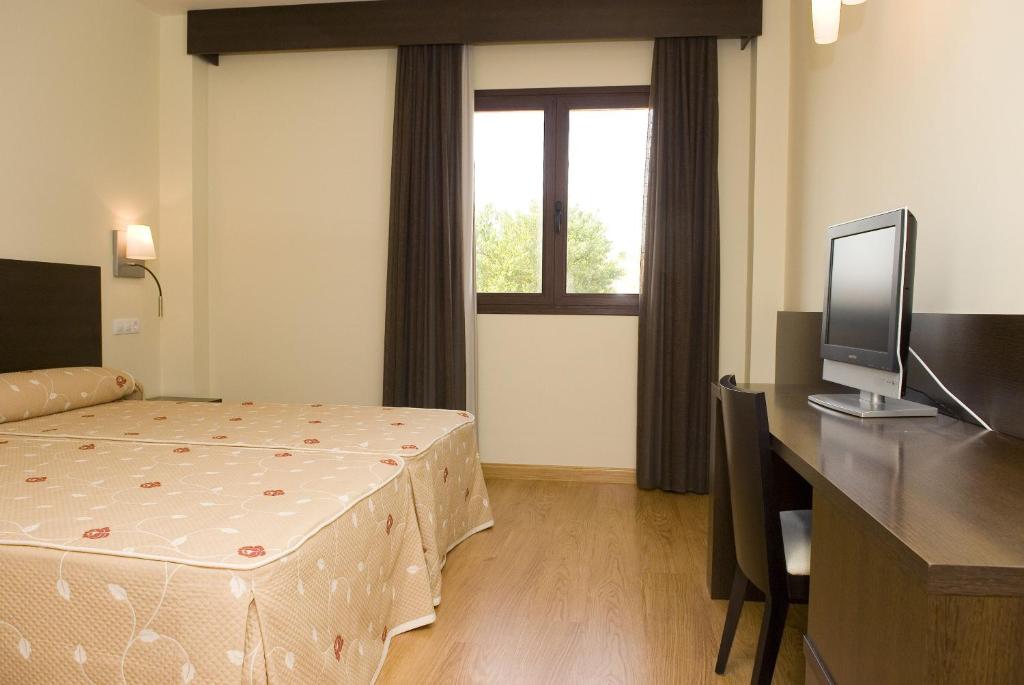 Hotel a Aranda De Duero con caricabatterie per auto elettriche