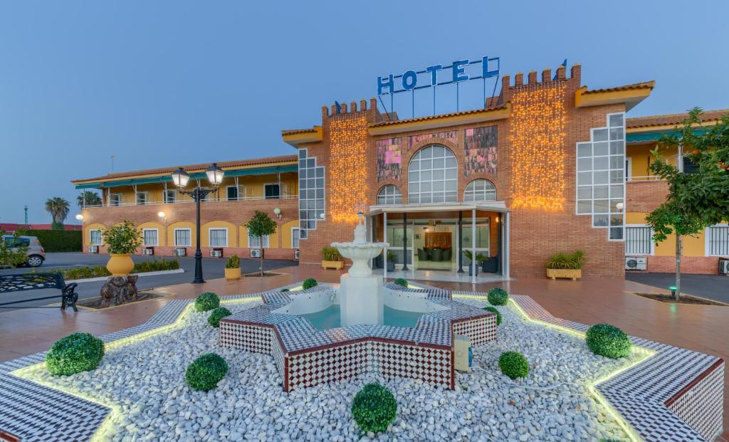 Hotel a La Algaba con caricabatterie per auto elettriche