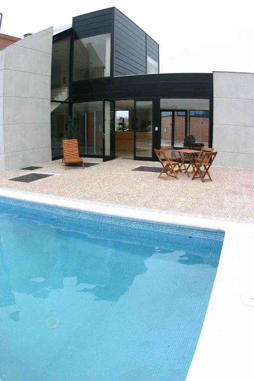 Hotel a Puente San Miguel con caricabatterie per auto elettriche