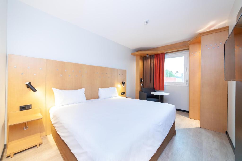 Hotel a Alcalá De Henares con caricabatterie per auto elettriche