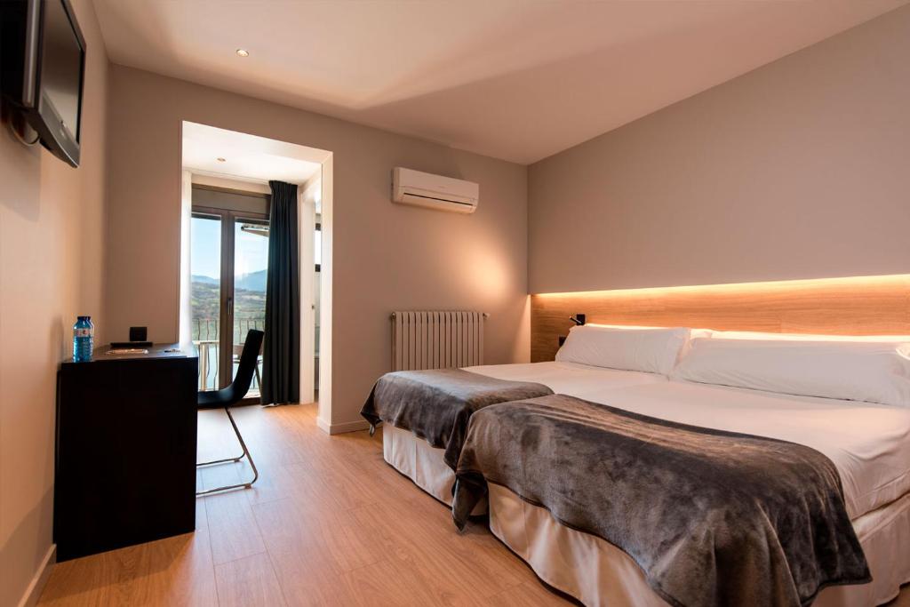 Hotel a Cellers con caricabatterie per auto elettriche